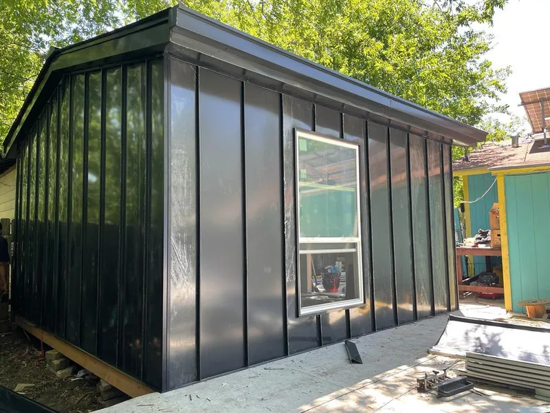 Black standing seam metal wall panels for Metal Roof Installation in Lower Salford